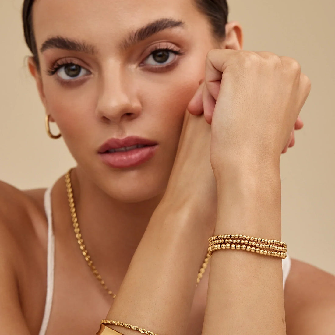 433 Conjunto de Pulseiras com Esferas Douradas